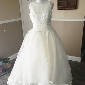 Tulle, Pearl Ballgown with ribbon detail on skirt.